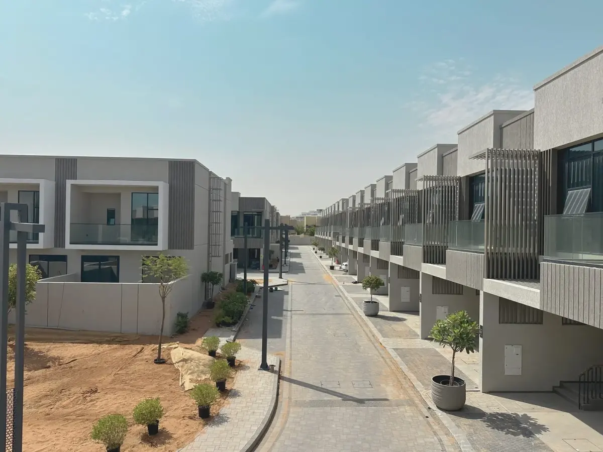 Bella Vida townhouse villas along a planted street, Al Barsha South, Dubai